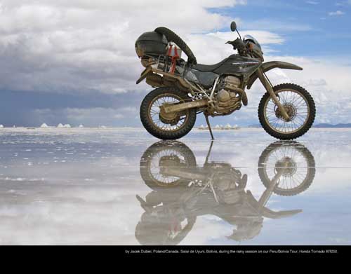 February: by Jacek Dubiel, Poland/Canada. Salar de Uyuni, Bolivia, during the rainy season on our Peru/Bolivia Tour; Honda Tornado XR250. 