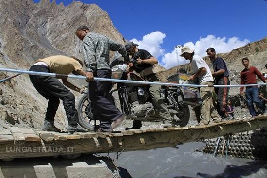 Crossing a bridge in Pakistan.