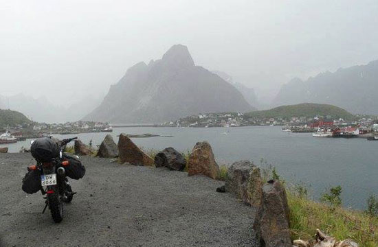 Olga's bike beside a river.