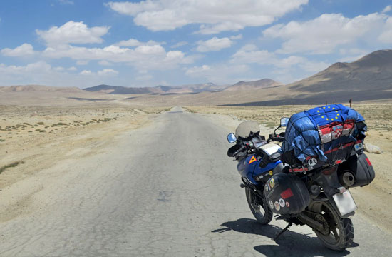 Bike facing the long Pamir Hwy