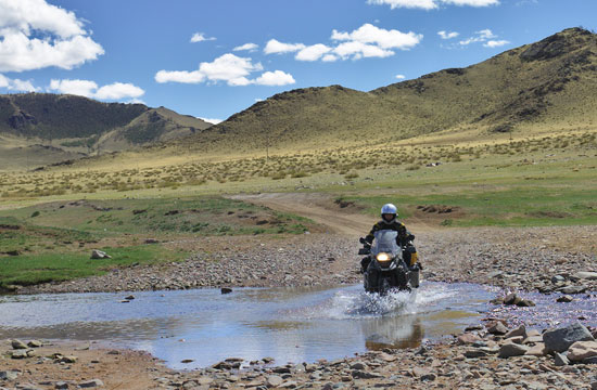 Janosch crossing a stream