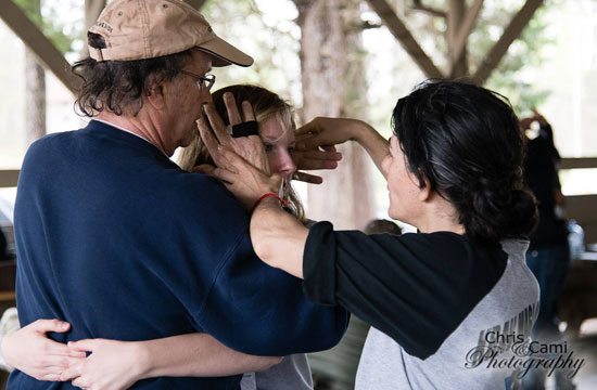 Joelle instructing krav maga technique.