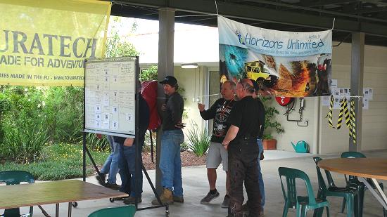 Perusing the schedule at HU Queensland 2015.