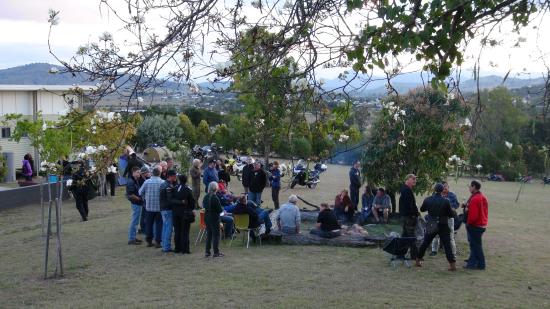 Conversations around the fire pit at HU Queensland.