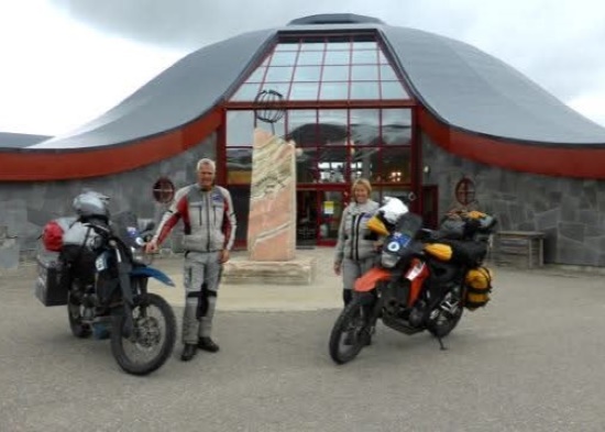 Alan Curtis and Lyn Williams with their motorcycles.