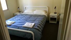 Camp Marysville - queen bedroom in Family cabin.