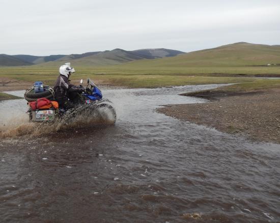 Geoff Bransbury crossing water.