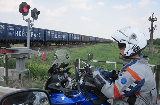 Cathy Davies, waiting for a train to go by