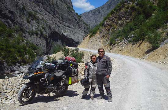 Karen and Vince on a mountain road.