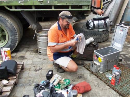 Troy cleaning bike parts.