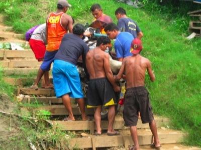 Getting the bike off the boat in Porto Velho, Brazil.