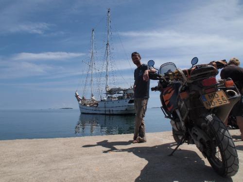 Daan and bike on beach.