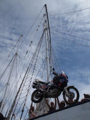 Beloved bike dangling on a piece of rope.