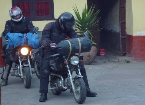 German Riders Heading To The Bus Station On Their Mini Bikes.